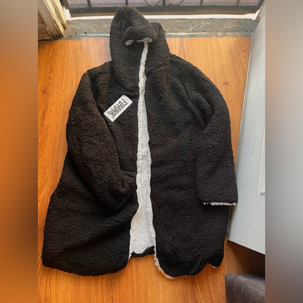 White/Black Sweater, In size Medium, Brand is Fuyukai, Material is Soft and Warm